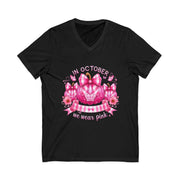 Black t-shirt with pink pumpkin and butterfly design on a white background