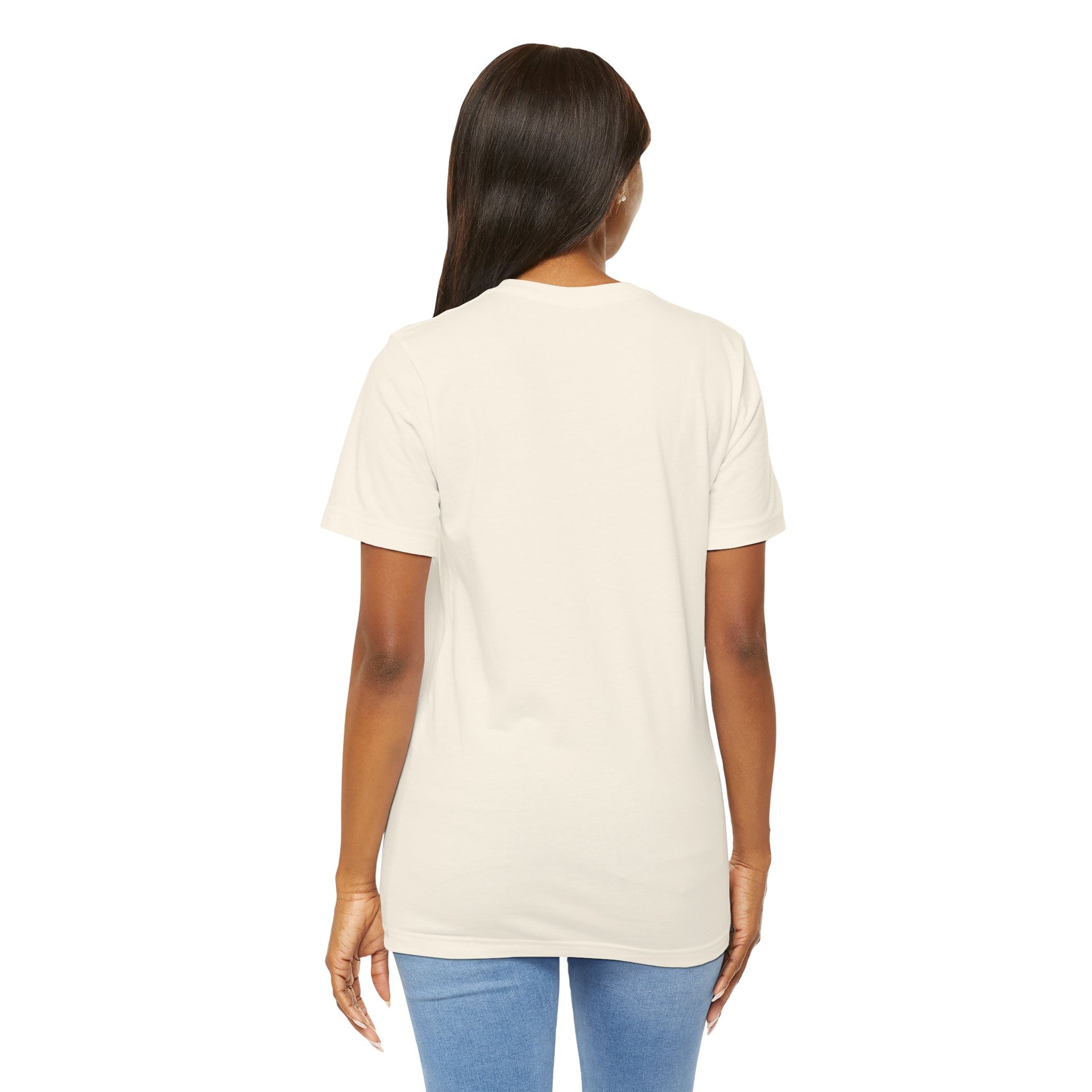 Person wearing a plain white t-shirt on a white background