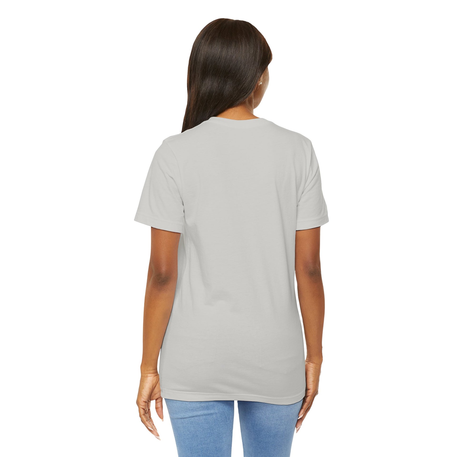 Person wearing a plain gray t-shirt on a white background