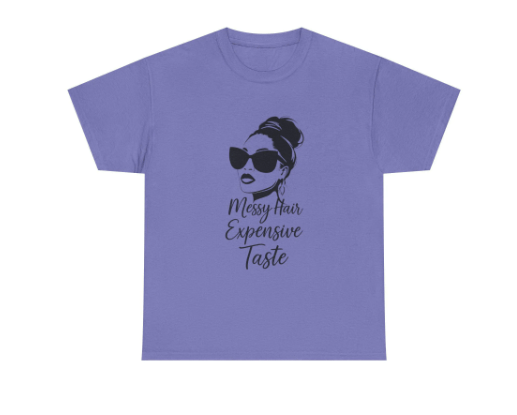 Purple t-shirt with a graphic of a woman with messy hair and sunglasses and text 'Messy Hair Expensive Taste' on a white background.