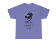 Purple t-shirt with a graphic of a woman with messy hair and sunglasses and text 'Messy Hair Expensive Taste' on a white background.
