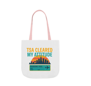White tote bag with colorful design and text on a white background