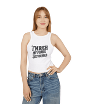 Woman wearing a white tank top with text and blue jeans on a white background