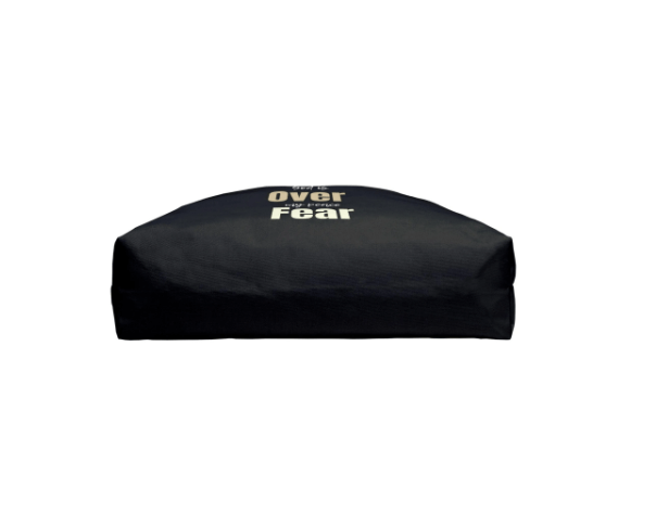 Black cushion with 'Live Above Fear' text on a white background