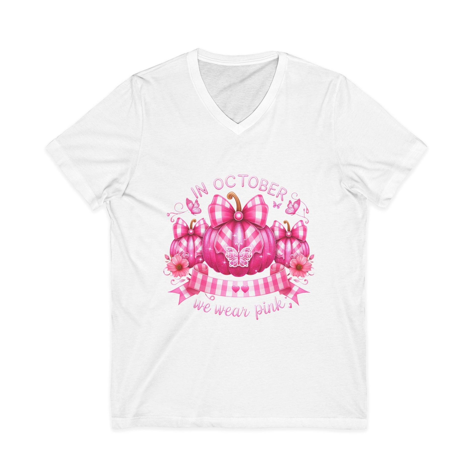 White t-shirt with pink pumpkin and ribbon design on a white background