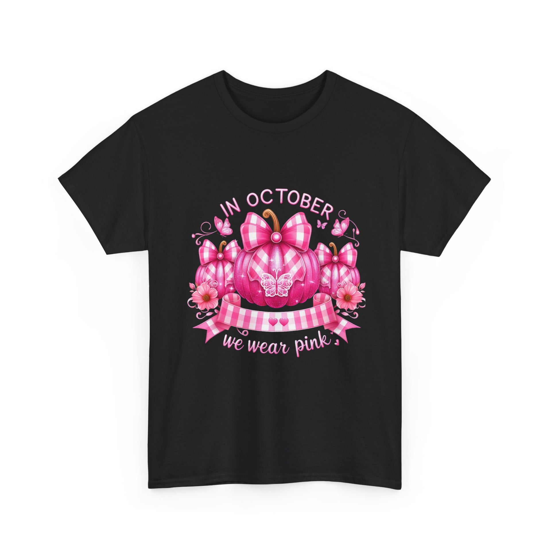 Black t-shirt with pink pumpkin design and 'In October we wear pink' text on a white background
