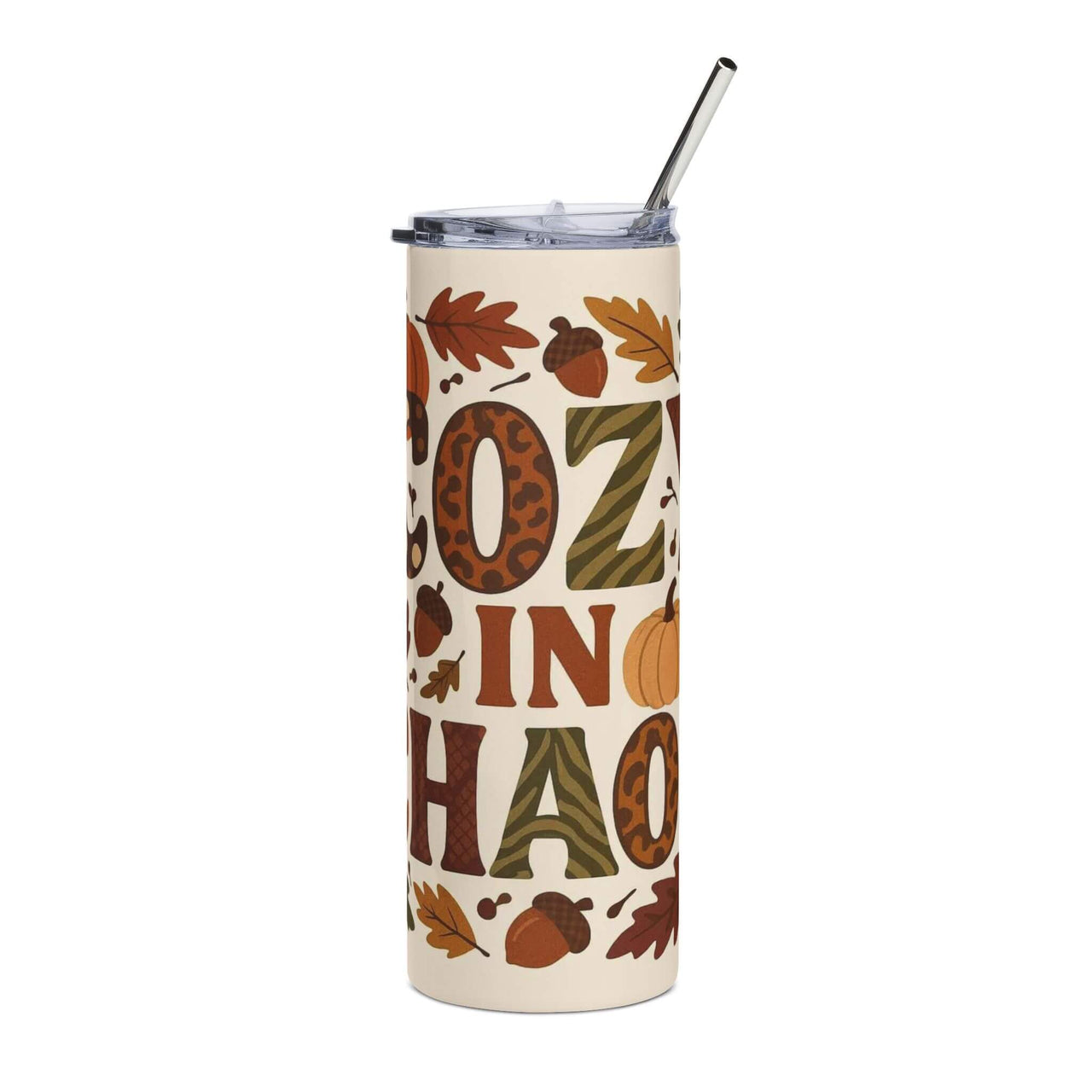 Tumbler with autumn-themed design and straw on a white background
