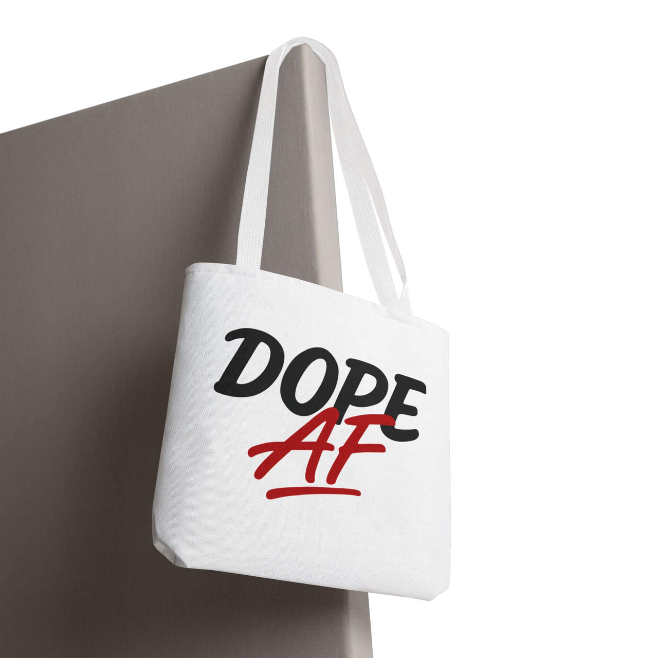 White tote bag with 'DOPE AF' text on a white background