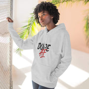 Person wearing a gray hoodie with 'DOPE AF' text, standing indoors with plants in the background