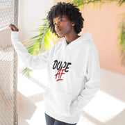 Person wearing a white hoodie with 'DOPE AF' text, standing against a light background with plants.