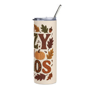 Tumbler with autumn-themed design featuring leaves and pumpkins on a white background