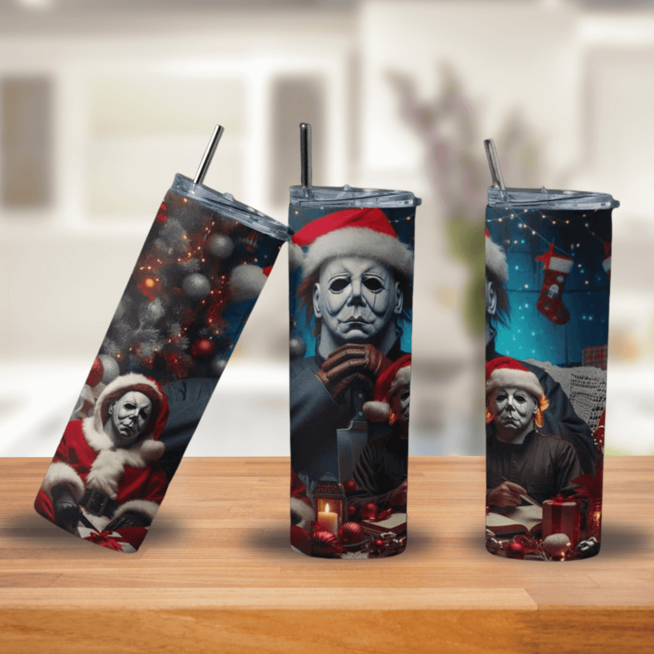 Three tumblers with festive design featuring a character in a Santa hat on a wooden surface.