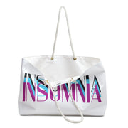 White tote bag with 'Insomnia' text in colorful letters on a white background