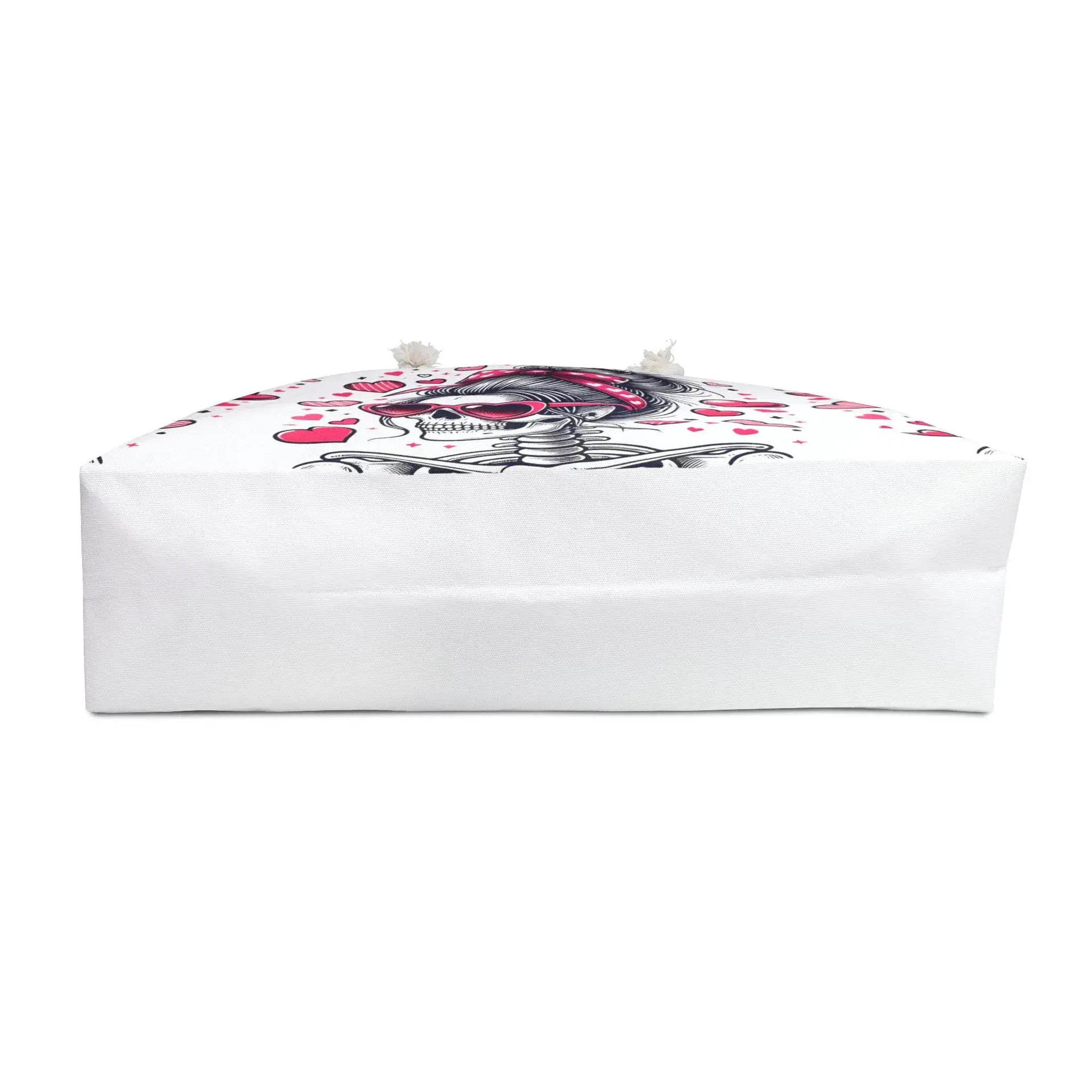 White rectangular box with a black and pink design on a white background