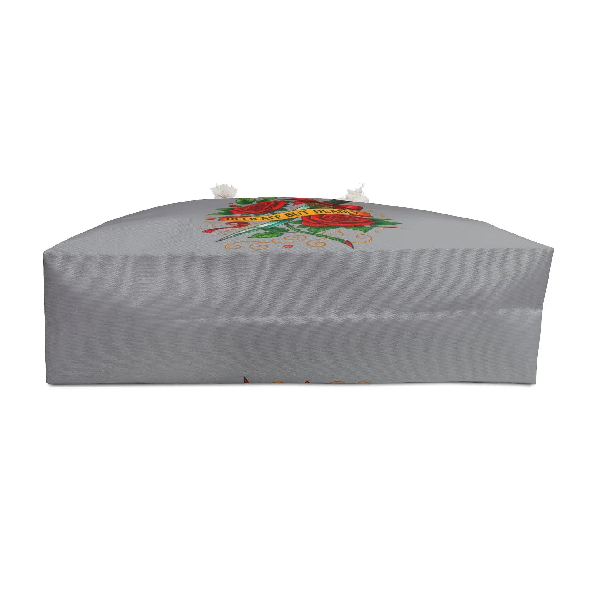 Gray coffin with floral design on a white background