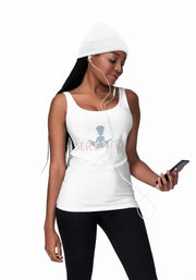 Woman wearing a white tank top with a graphic design, holding a phone, on a white background