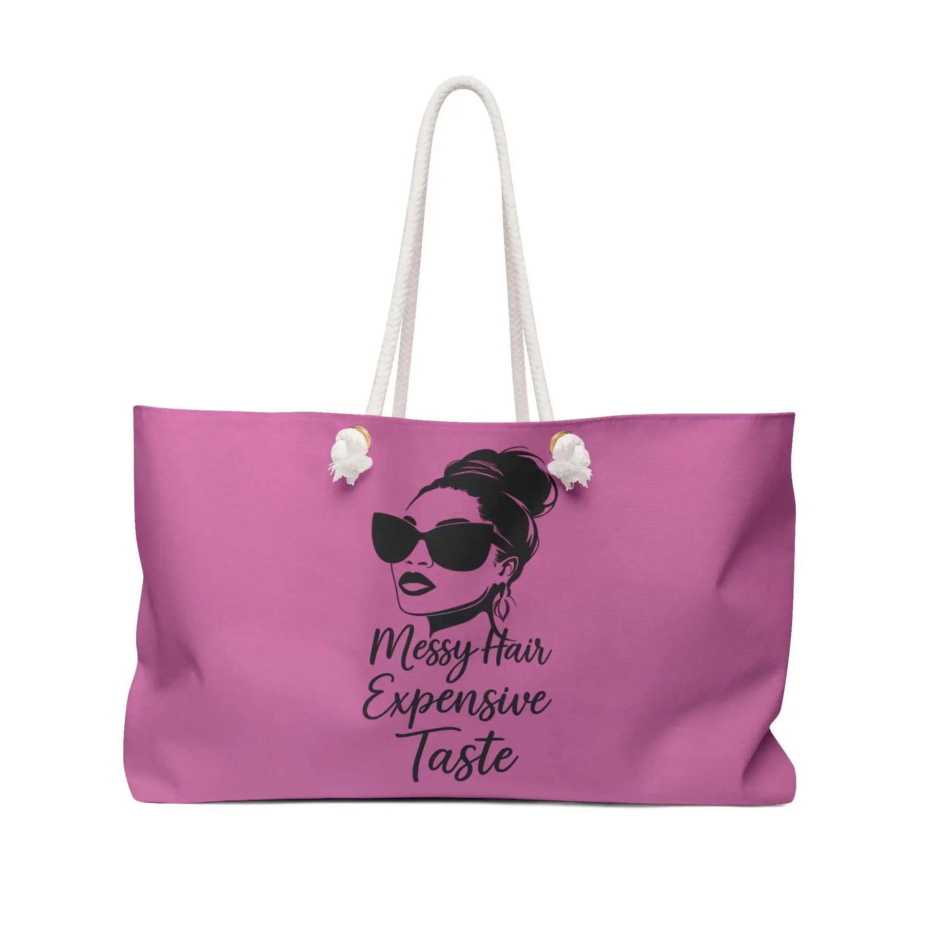Pink tote bag with a graphic of a woman with sunglasses and text on a white background