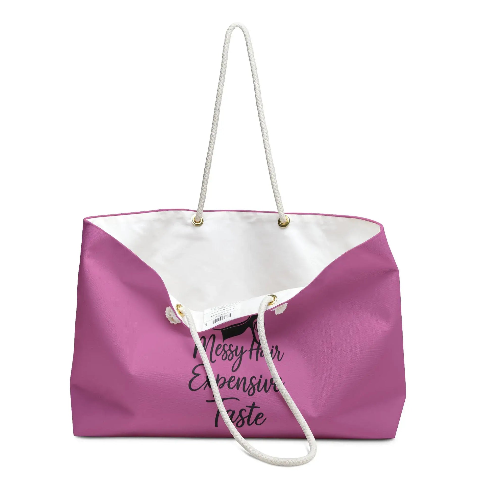 Pink tote bag with white interior and handle on a white background