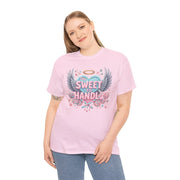 Person wearing a pink t-shirt with a graphic design on a white background