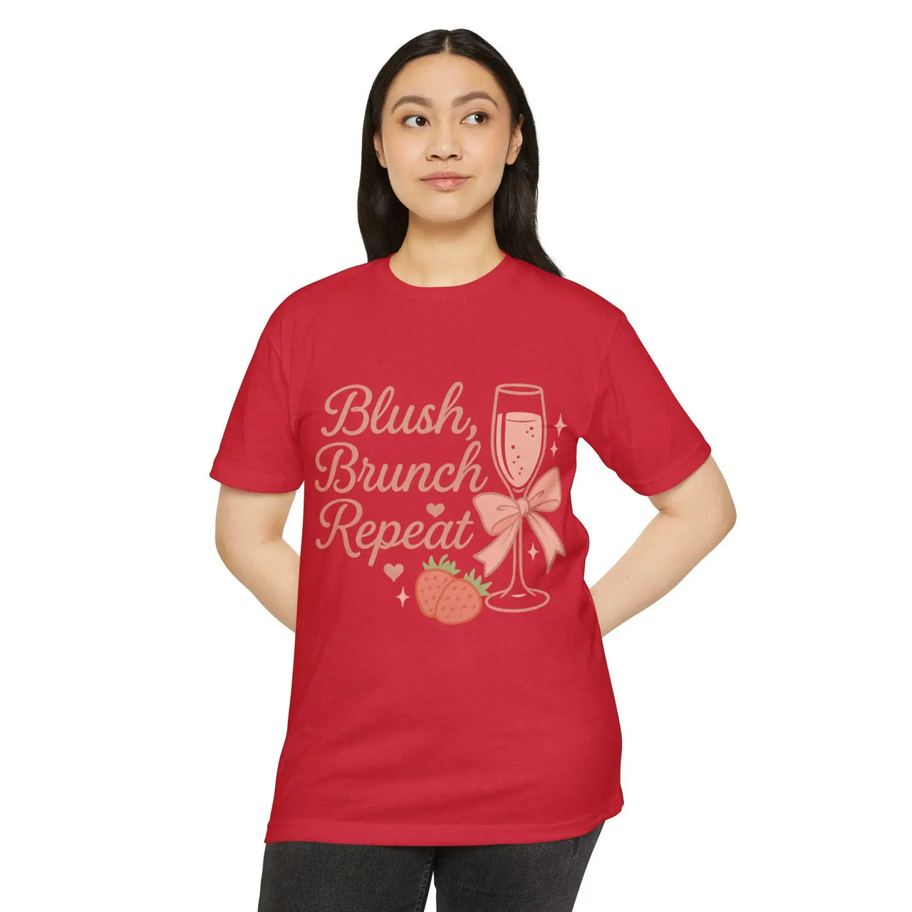 Person wearing a red t-shirt with 'Blush, Brunch Repeat' text and graphics on a white background