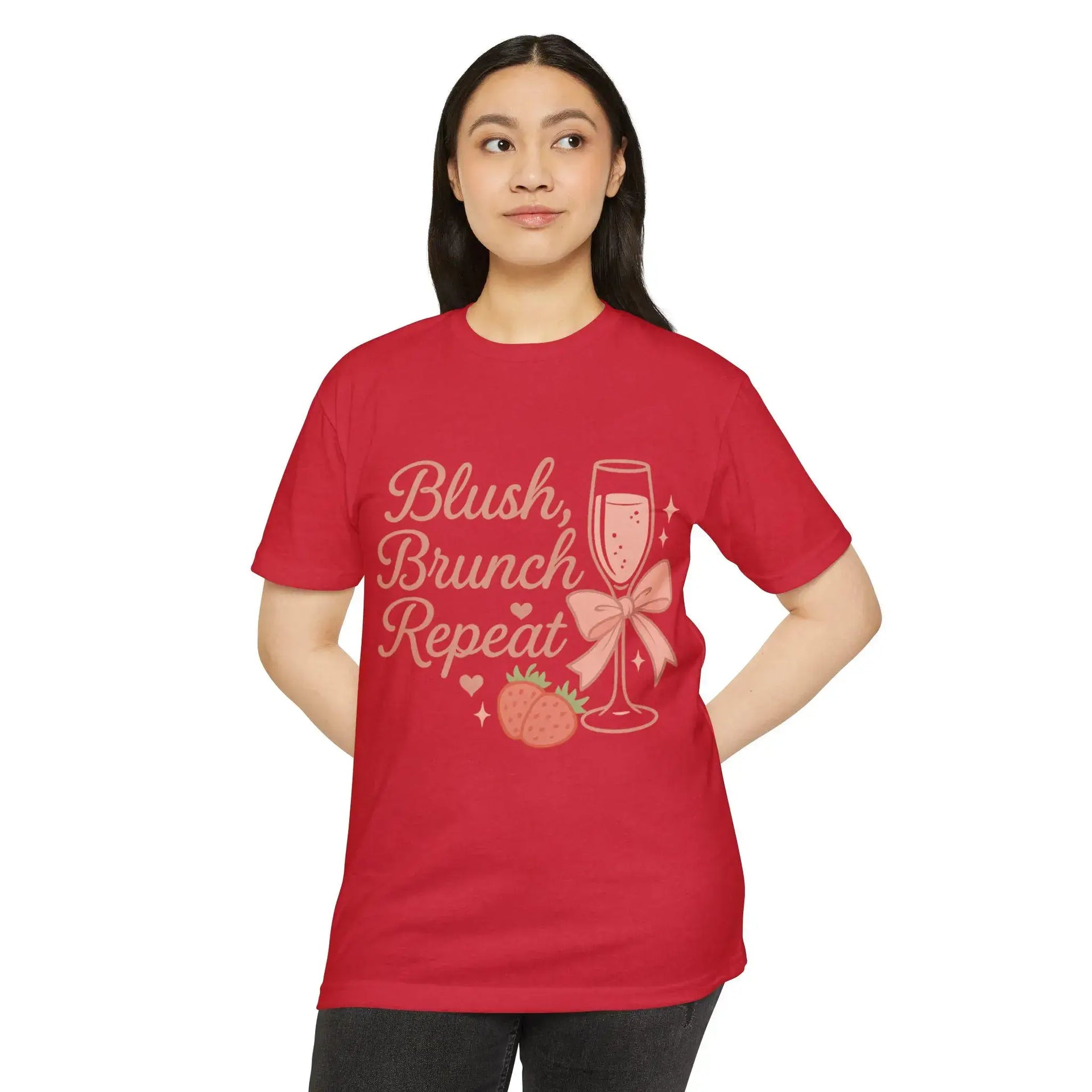Person wearing a red t-shirt with 'Blush, Brunch Repeat' text and graphics on a white background