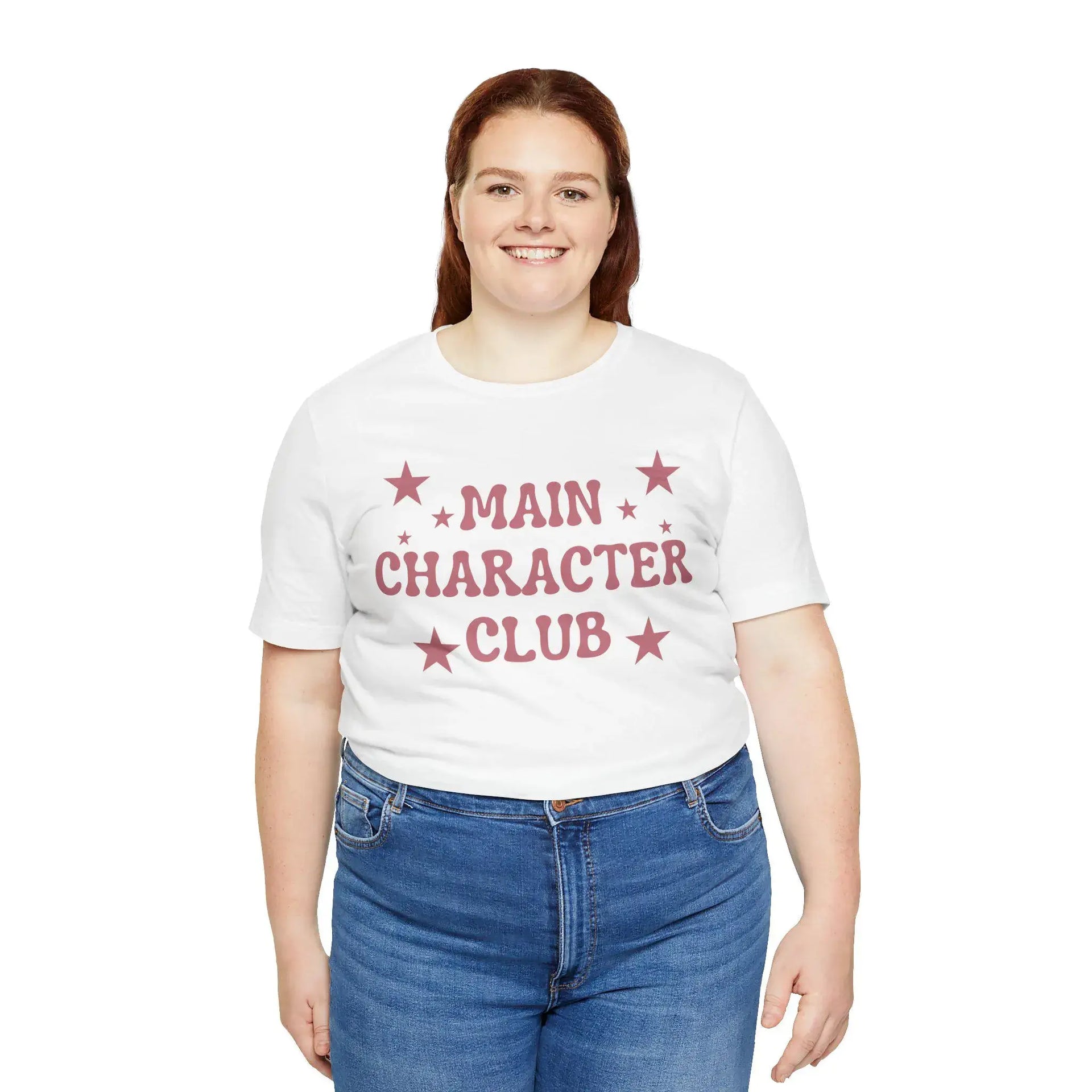 Person wearing a white t-shirt with 'MAIN CHARACTER CLUB' text and stars on a white background