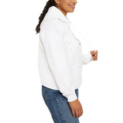 Person wearing a white hoodie and blue jeans on a white background