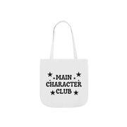 White tote bag with 'MAIN CHARACTER CLUB' text and star designs on a white background