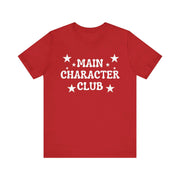 Red t-shirt with 'Main Character Club' text and stars on a white background