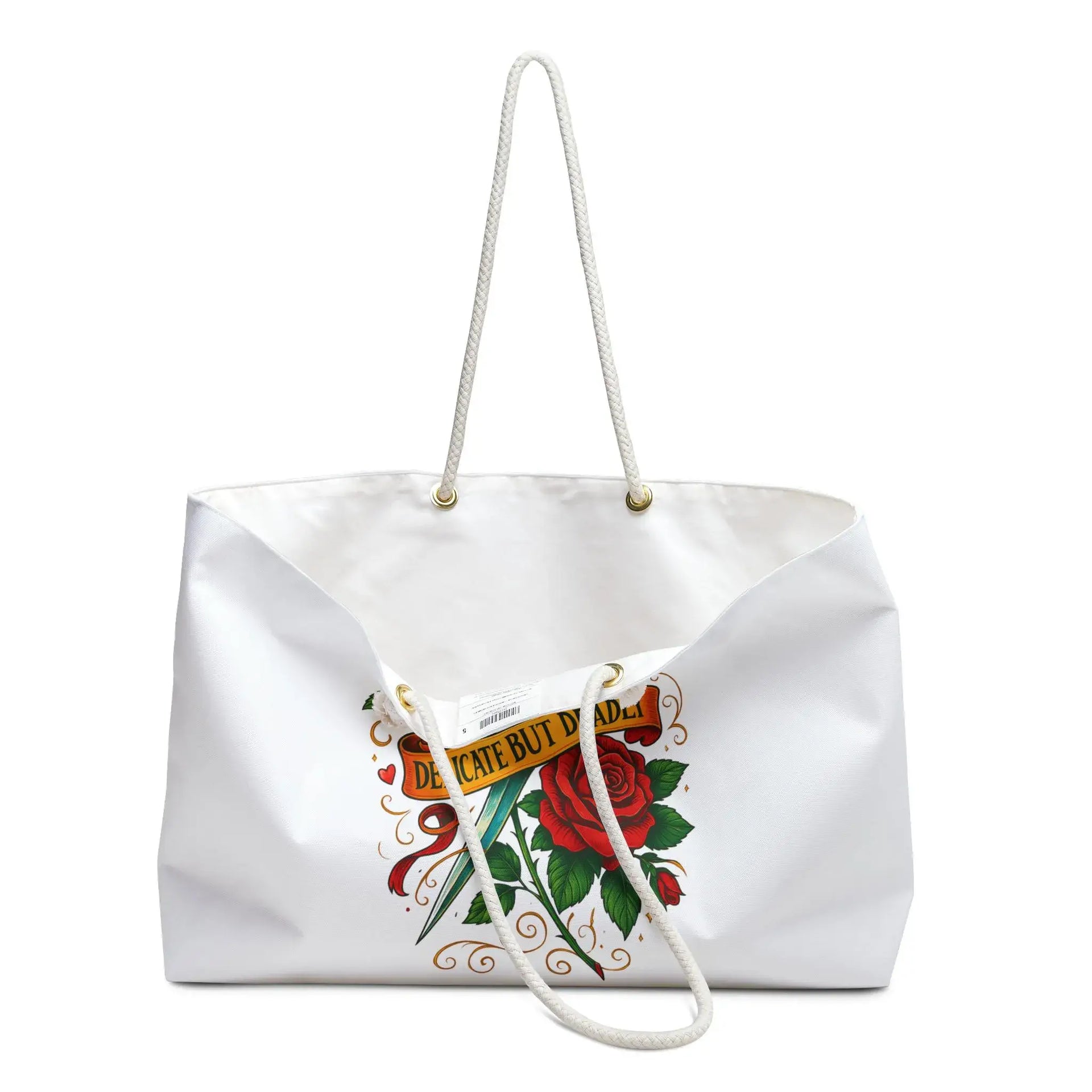 White tote bag with a red rose and text design on a white background