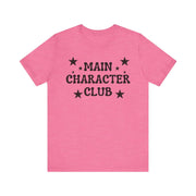 Pink t-shirt with 'MAIN CHARACTER CLUB' text and stars on a white background