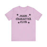 Pink t-shirt with 'Main Character Club' text and stars on a white background
