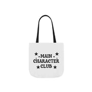 White tote bag with 'MAIN CHARACTER CLUB' text and star designs on a white background