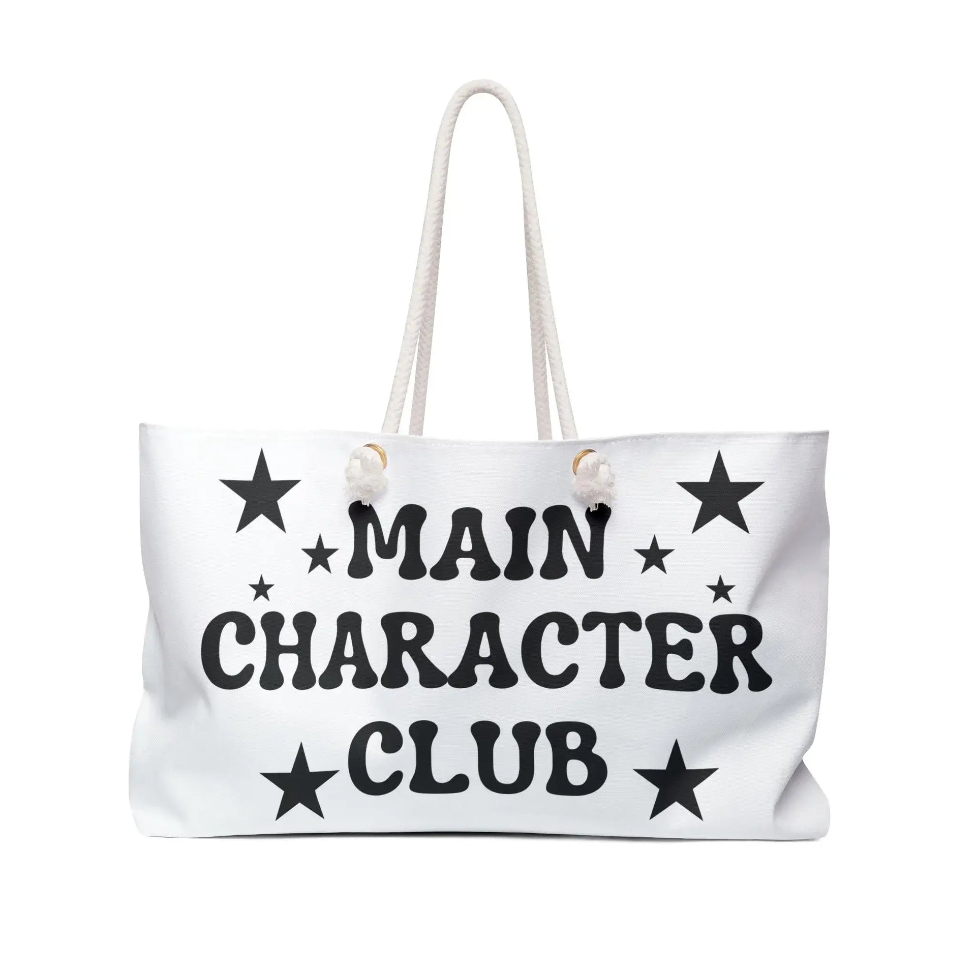 White tote bag with 'Main Character Club' text and star designs on a white background