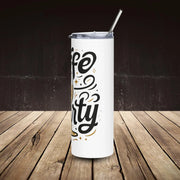 White tumbler with 'Life is Forty' text on a wooden surface and dark background