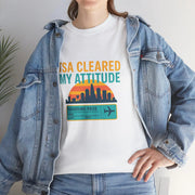 Person wearing a white t-shirt with a colorful graphic and text, paired with a denim jacket.