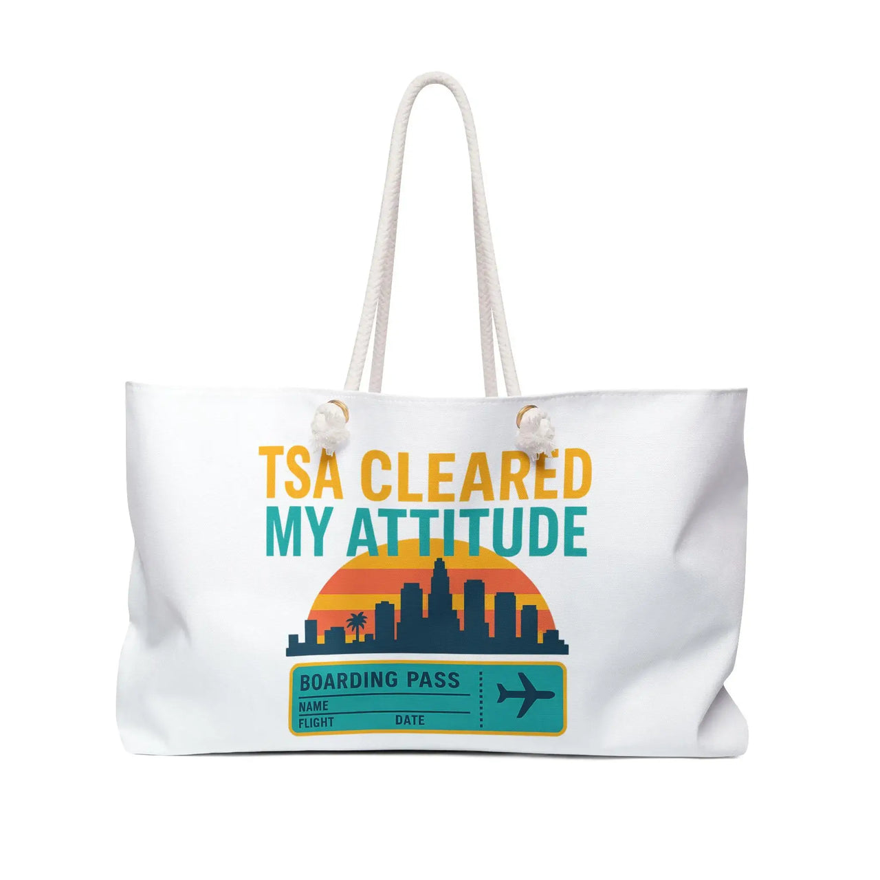 White tote bag with 'TSA Cleared My Attitude' text and airplane design on a white background