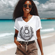 Woman wearing a white t-shirt with 'Bride' design on a beach