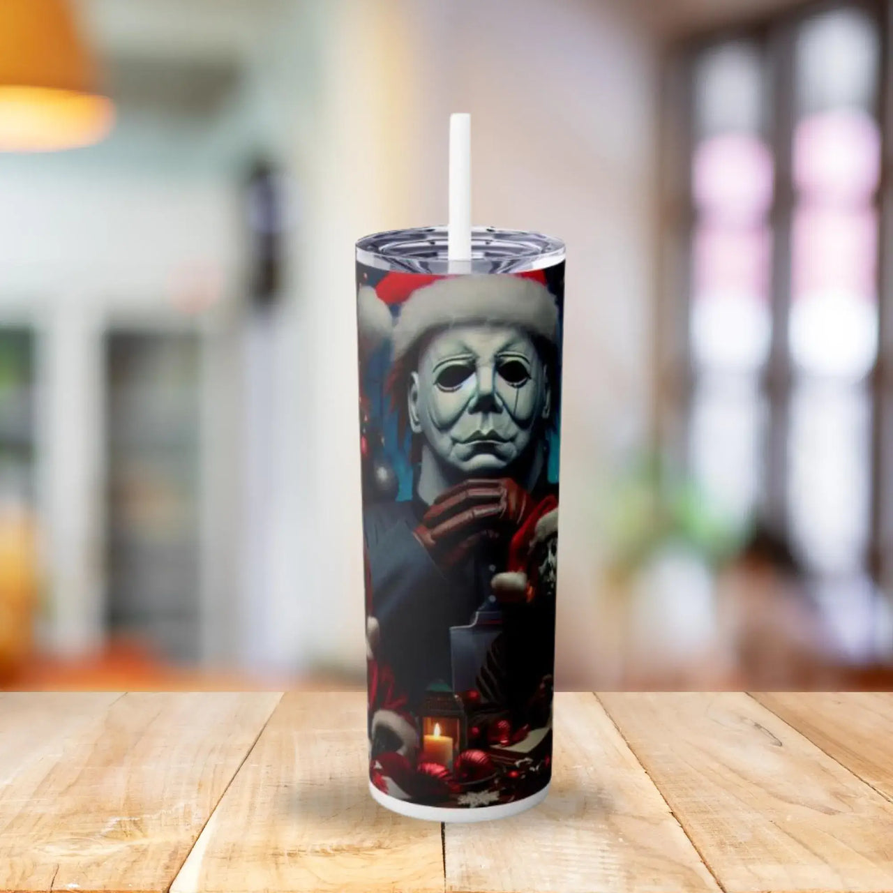 Tumbler with a graphic design on a wooden table with a blurred background