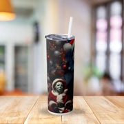 Tumbler with a design on a wooden table with a blurred background