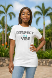 Woman wearing a white t-shirt with 'RESPECT MY VIBE' text, standing outdoors with palm trees in the background.