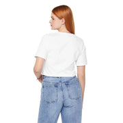 Person wearing a white t-shirt and blue jeans on a white background