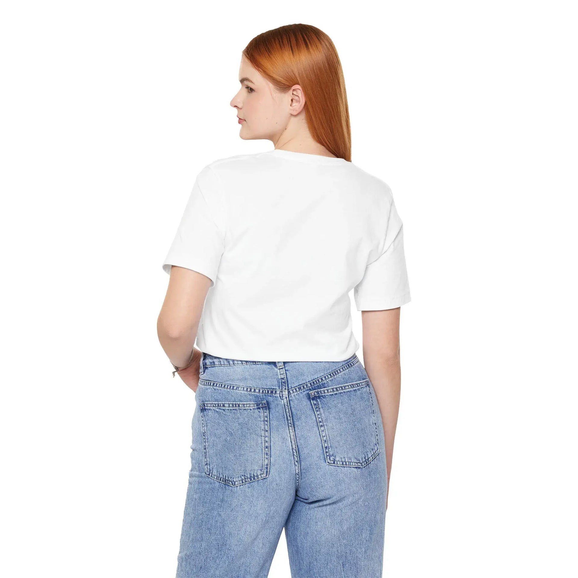 Person wearing a white t-shirt and blue jeans on a white background