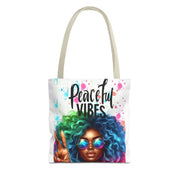 Tote bag with a colorful design of a woman with green and blue hair and 'Peaceful Vibes' text on a white background.