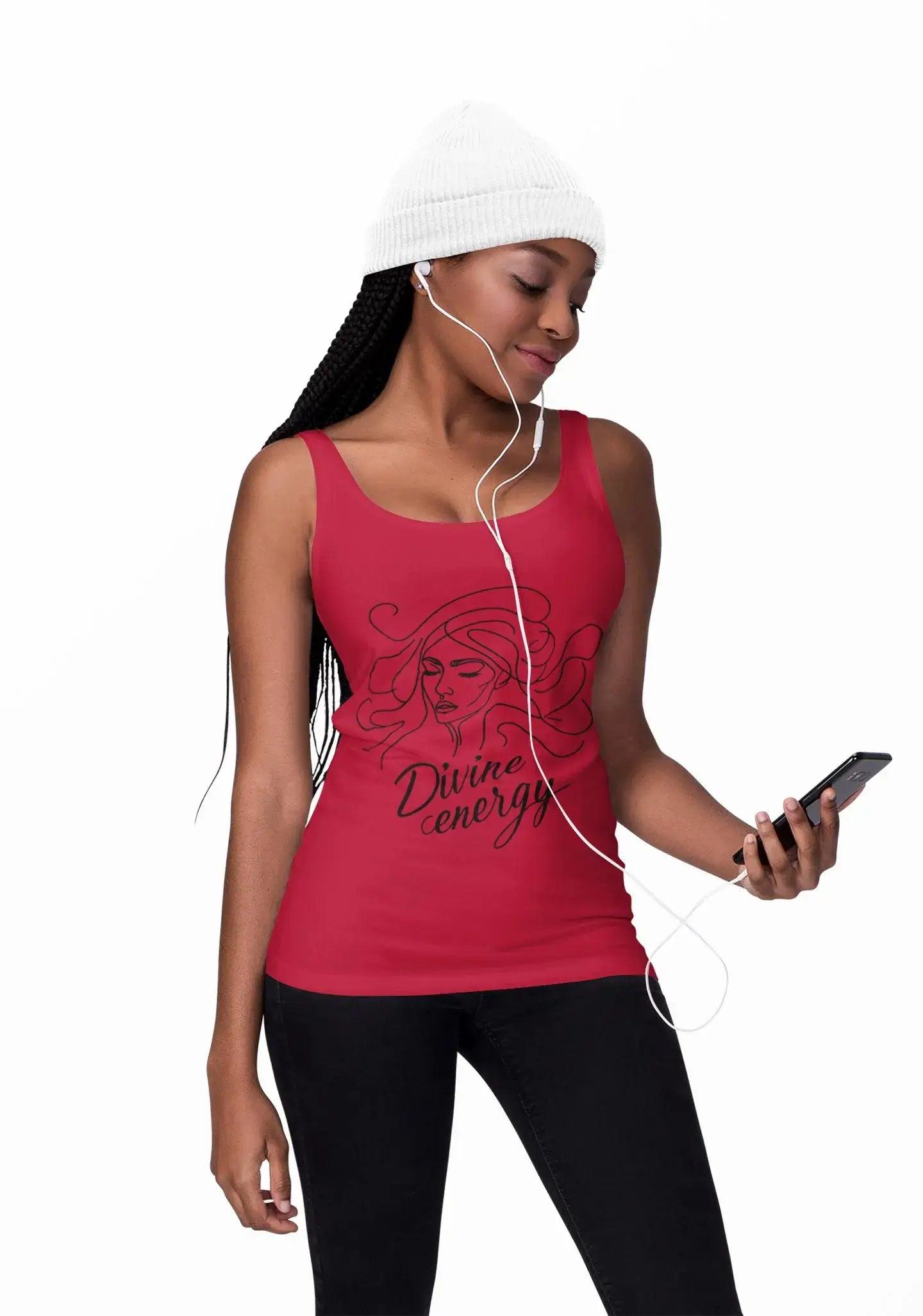 Woman wearing a red tank top with a design and text, listening to music on earphones.
