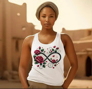 Woman wearing a white tank top with a floral infinity symbol design in an outdoor setting.