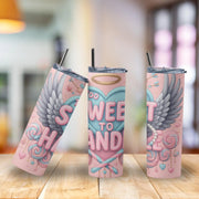 Pink tumbler with angel wings and 'Too Sweet To Handle' text on a wooden surface.