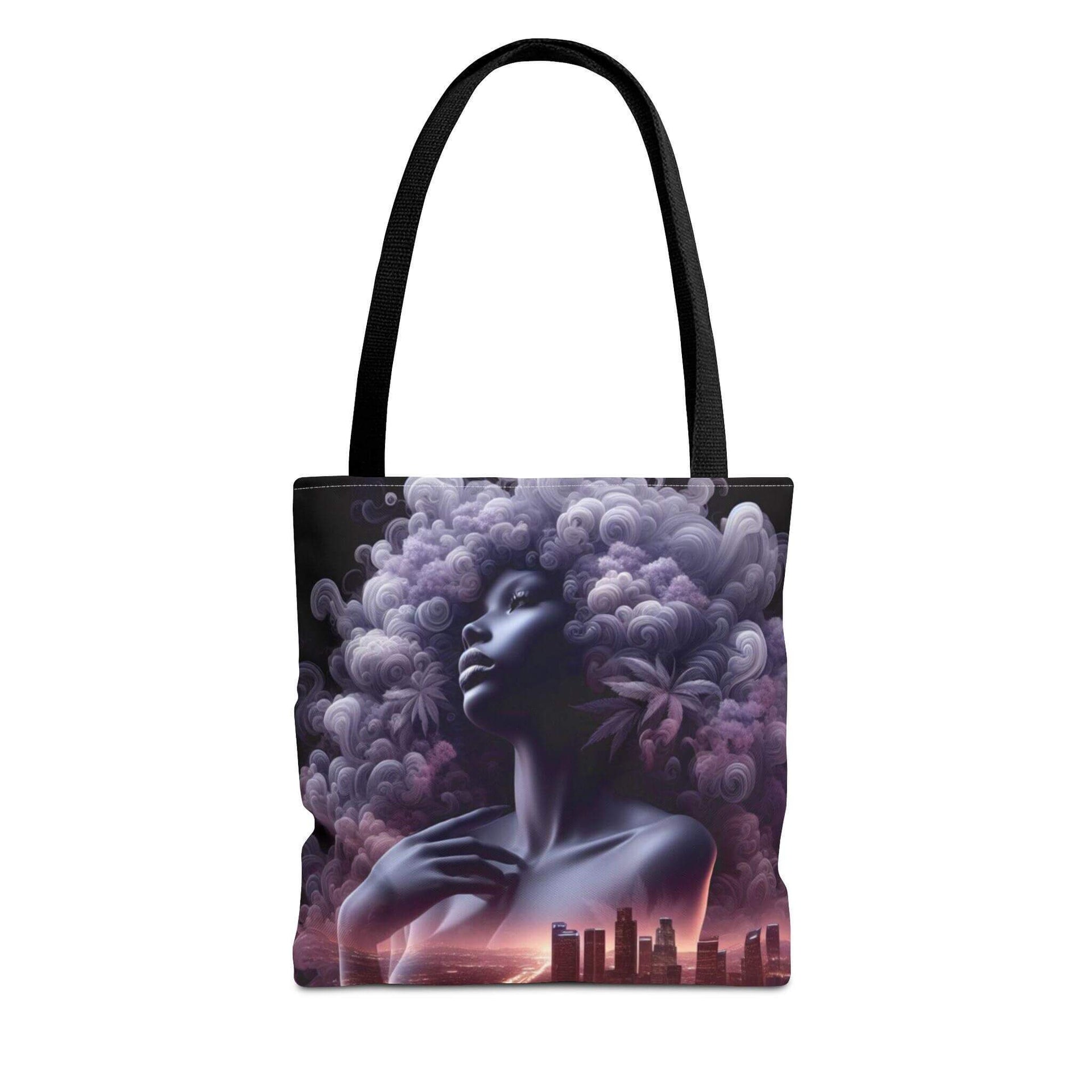 Tote bag with artistic design of a woman with a large afro and cityscape in the background on a white background.