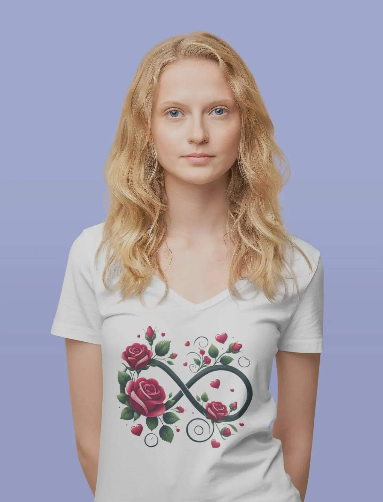 Woman wearing a white t-shirt with a floral infinity symbol design on a purple background
