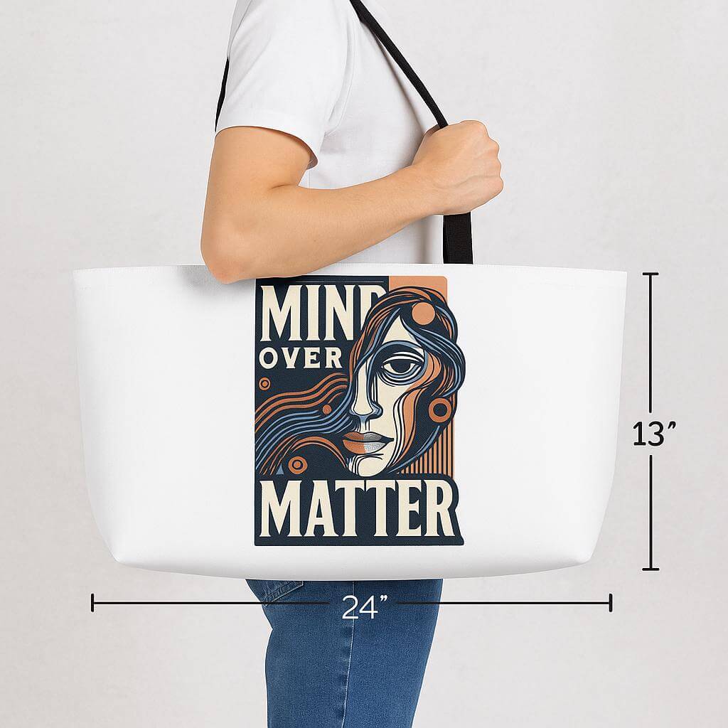 Tote bag with 'Mind Over Matter' design held by a person, with dimensions displayed.